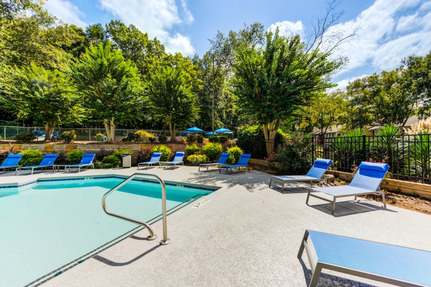 Swimming pool at Laurel Oaks with a shaded area